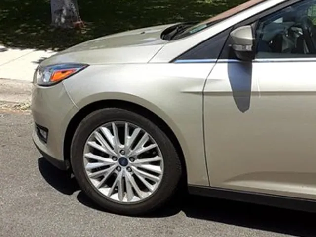 Champagne Ford Focus after dent repair