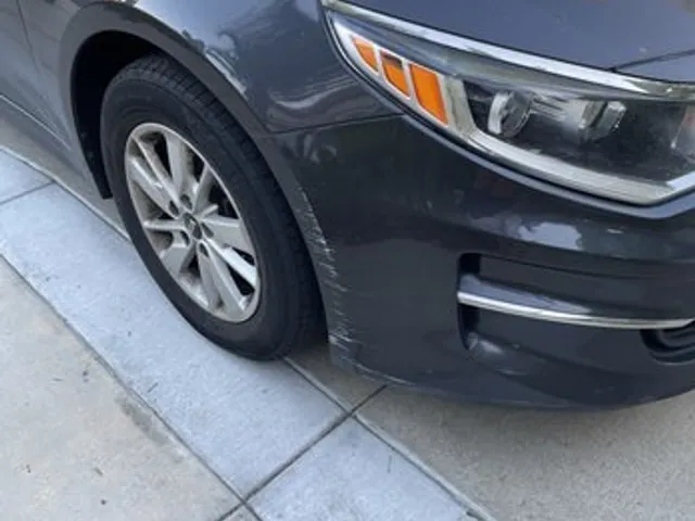 Gray Kia repaired by The Dent Specialist